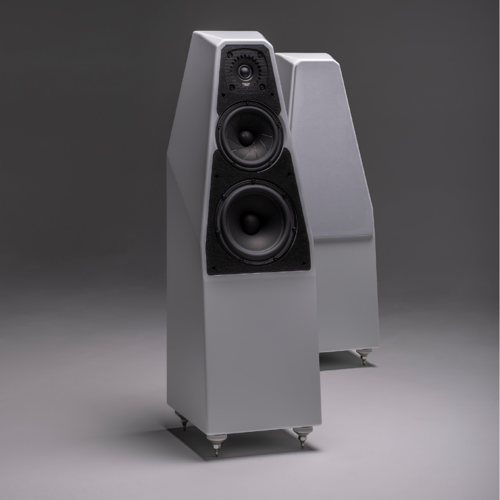 Wilson Audio high-end floorstanding loudspeakers in matte white finish featuring precision-engineered driver array and sculptural cabinet design.